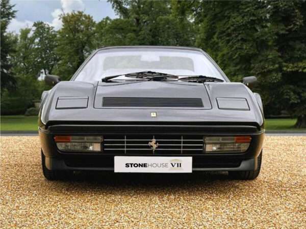 Classic 1988 Ferrari 328 GTS. As confirmed by the Ferrari Classiche expert Tony Willis, this car is the one and only RHD car delivered to the UK in the ultra rare combination of Nero with Bordeaux interior. www.stonehouse7.com