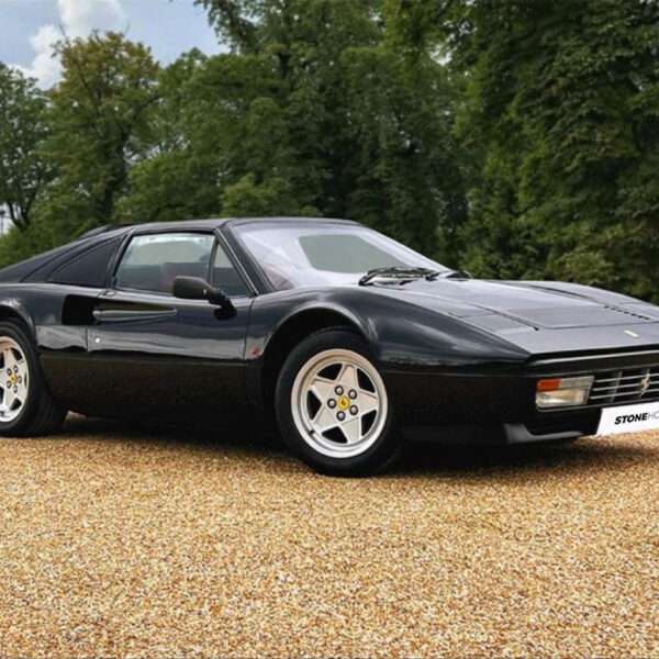 Classic 1988 Ferrari 328 GTS. As confirmed by the Ferrari Classiche expert Tony Willis, this car is the one and only RHD car delivered to the UK in the ultra rare combination of Nero with Bordeaux interior. www.stonehouse7.com