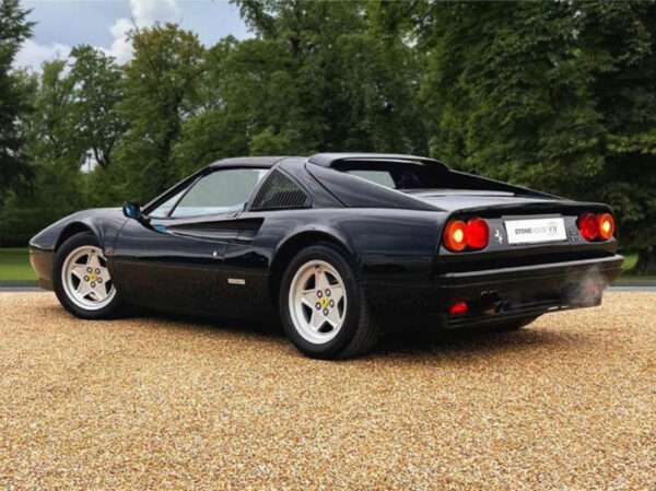 Classic 1988 Ferrari 328 GTS. As confirmed by the Ferrari Classiche expert Tony Willis, this car is the one and only RHD car delivered to the UK in the ultra rare combination of Nero with Bordeaux interior. www.stonehouse7.com