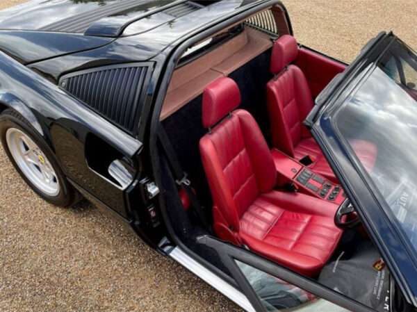 Classic 1988 Ferrari 328 GTS. As confirmed by the Ferrari Classiche expert Tony Willis, this car is the one and only RHD car delivered to the UK in the ultra rare combination of Nero with Bordeaux interior. www.stonehouse7.com